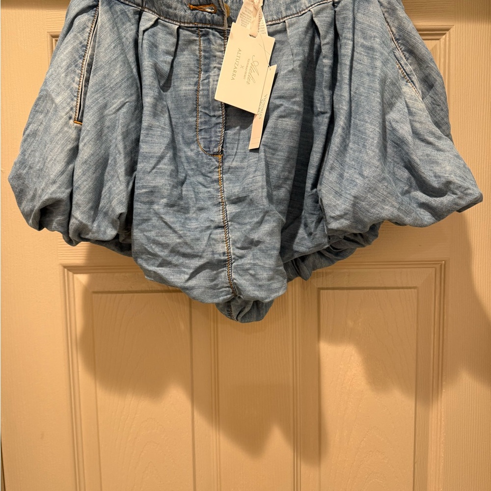 Victoria's Secret Denim Skirt with pockets zipper in the front with a button . - Picture 3 of 11